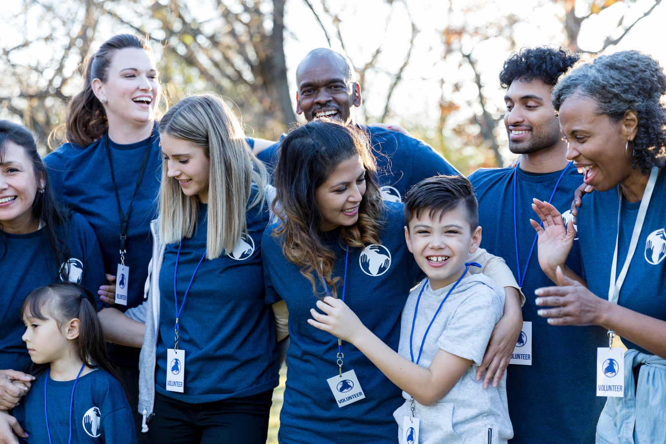 A group of adults and kids work together for a charitable foundation. Sparkrock 365, a foundation ERP software revolutionizes the way businesses operate.